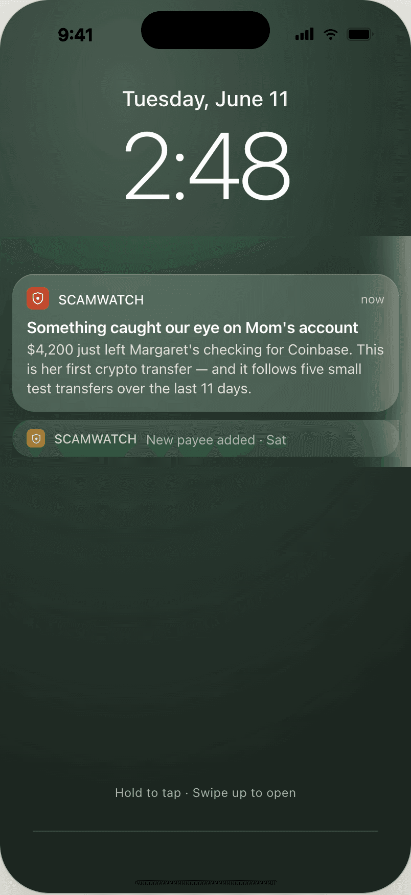 A ScamWatch push notification on a lock screen